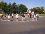 Students learn rules to be used during recess during p.e. class